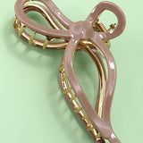JUMBO CELLULOSE CASTING BOW HAIR CLAW CLIPS | 40H759