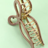 JUMBO CELLULOSE CASTING BOW HAIR CLAW CLIPS | 40H759